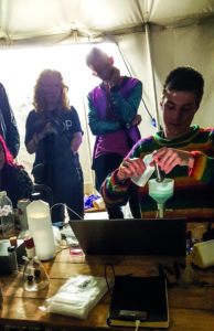 Measham (far left) and her team test drugs at a festival, allowing people to make an informed decision about taking them. Photos: Steve Rolles